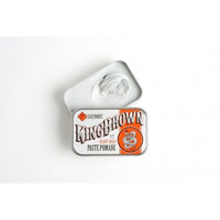 King Brown Paste Pomade - geopend blik met deksel en klodder witte pasta ernaast