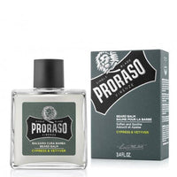 Proraso Beard Balm Cypress & Vetyver - glazen flacon naast grijze verpakkingsdoos