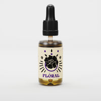 By Elementum Mollis Floral Beard Oil - vooraanzicht flesje met bloem-etiket en pipetdop