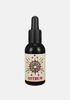 By Elementum Mollis Astrum Beard Oil - vooraanzicht zwart flesje met pipet en sterren-etiket