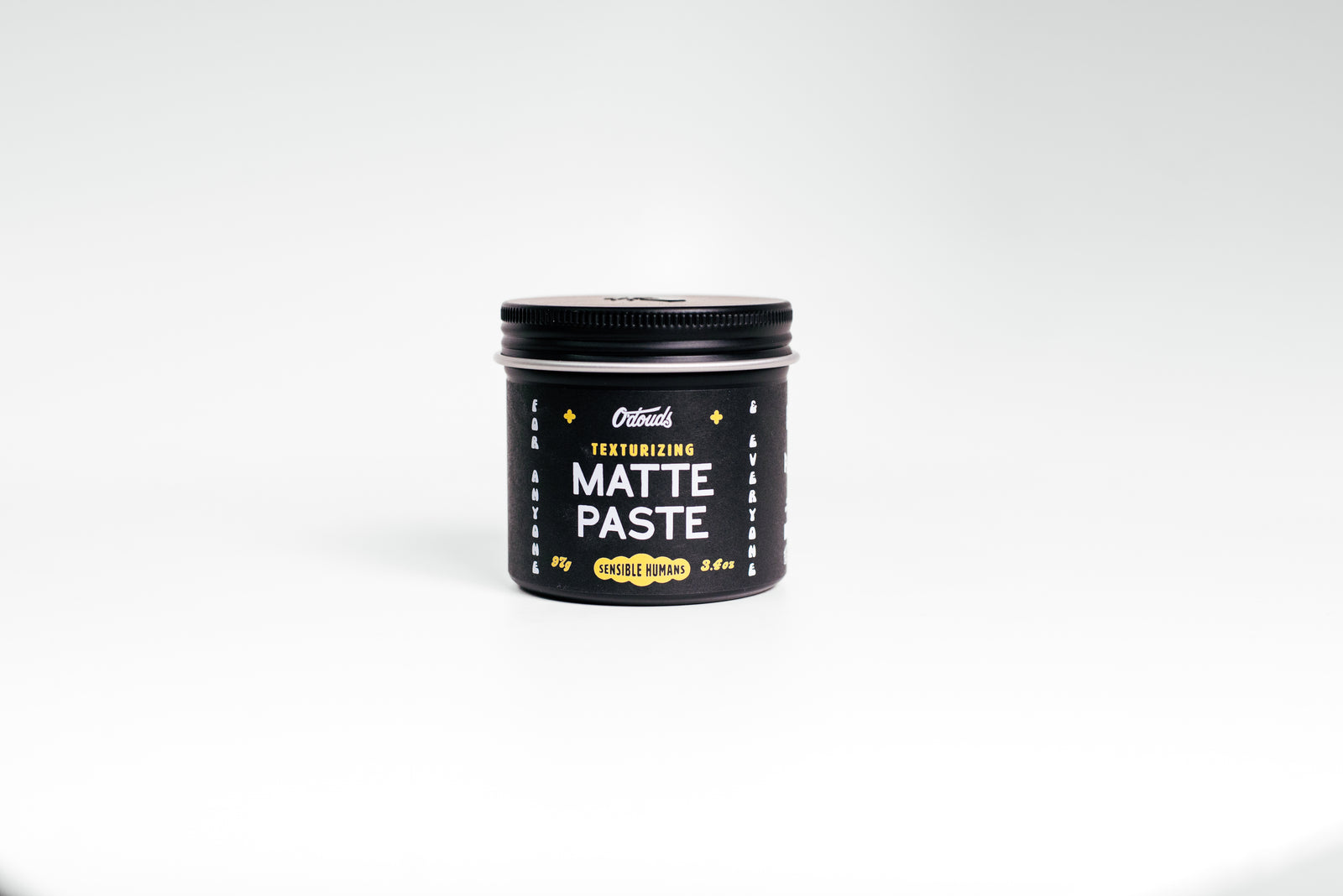 O'Douds Matte Paste - vooraanzicht zwarte pot met gele letters en deksel