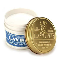 Layrite Natural Matte Cream - open pot met blauw etiket en gouden deksel ernaast