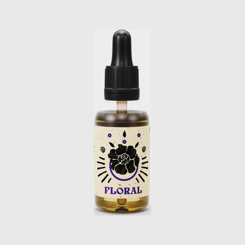 By Elementum Mollis Floral Beard Oil - vooraanzicht flesje met bloem-etiket en pipetdop